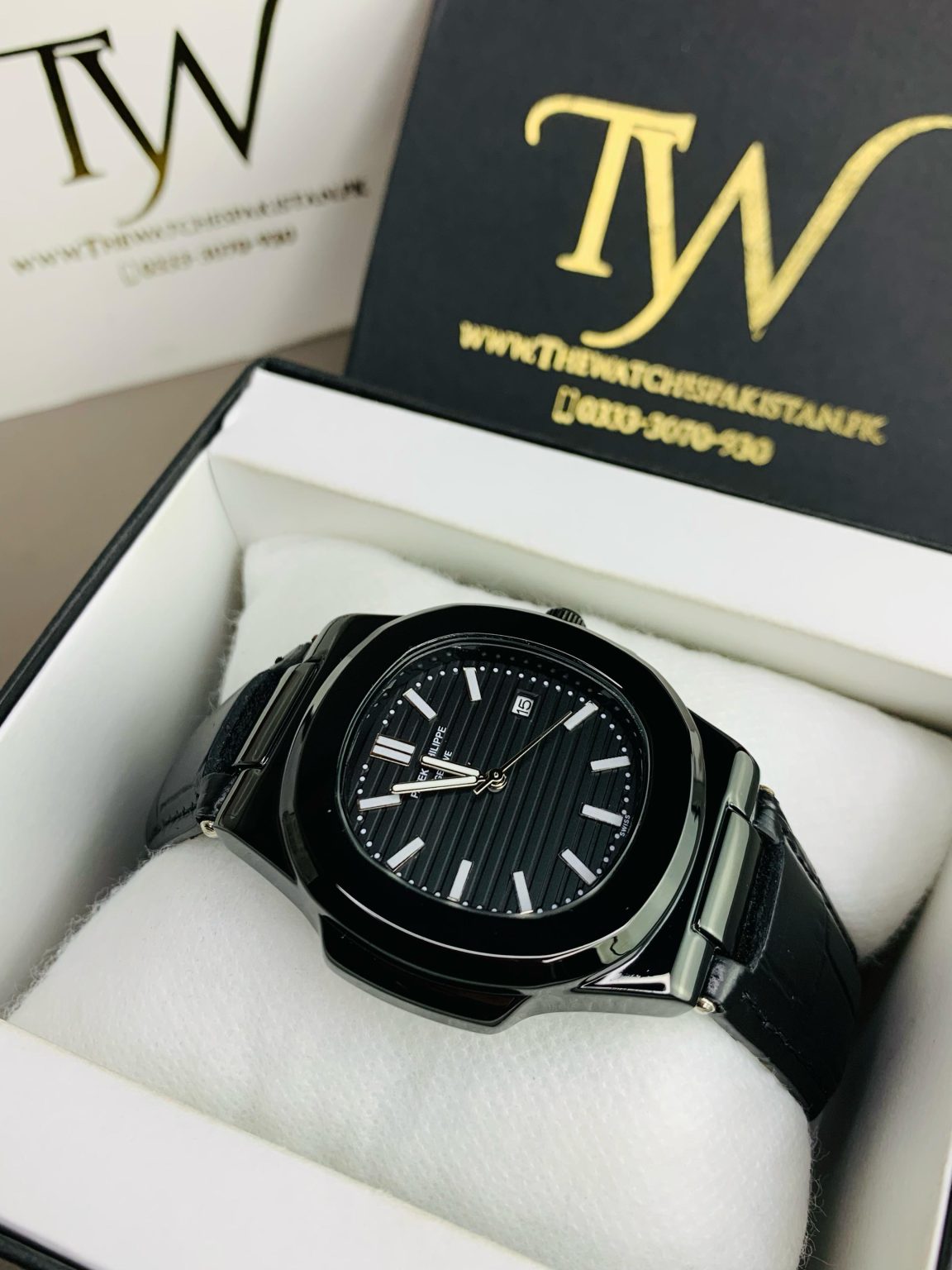 PATEK PHILIPPE FULL BLACK and GOLD NAUTILUS WATCH